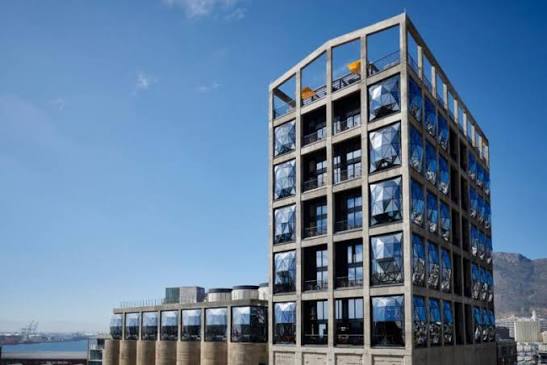 The Silo Hotel in Cape Town, with convex glass windows set into the concrete tower of a former grain elevator.